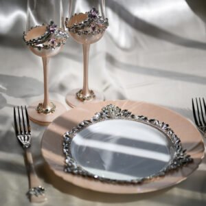 Grace Classic handcrafted luxury wedding set featuring rose gold champagne flutes with pink crystal crown rim, crystal-embellished plate with floral accents, and matching rose gold forks