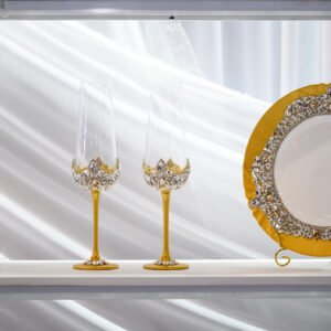 Aurelia Classic handpainted luxury wedding set with hand-placed crystals featuring golden cutlery, champagne glasses, and decorative plate