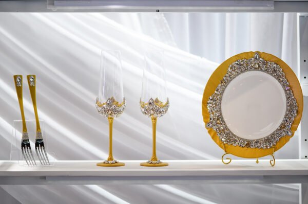 Aurelia Classic handpainted luxury wedding set with hand-placed crystals featuring golden cutlery, champagne glasses, and decorative plate